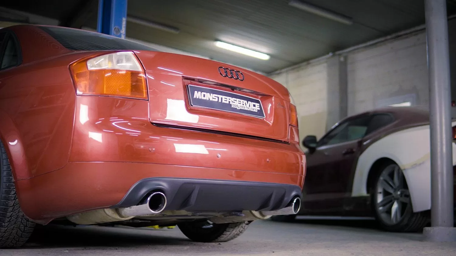 Rear bumper diffuser A4