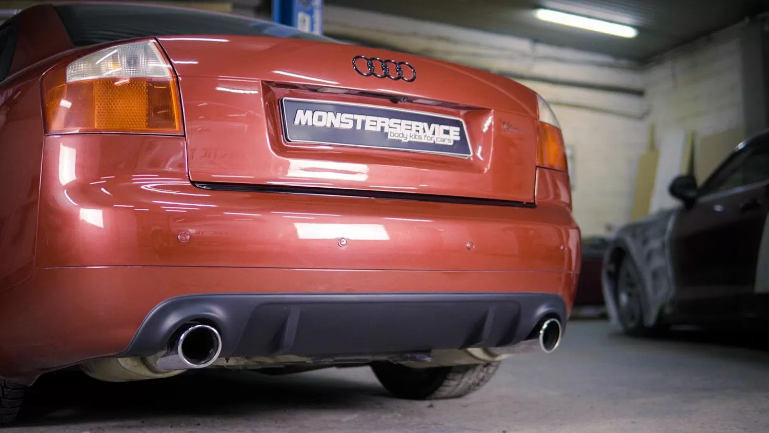 Rear bumper diffuser A4